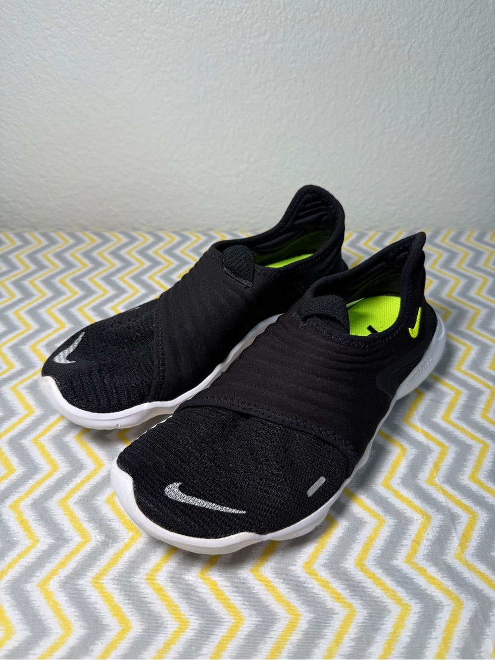 Nike Black Slip-On Athletic Shoes with Neon Green Accents